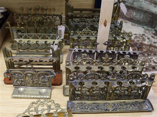 A collection of brass pipe racks, various (Q)